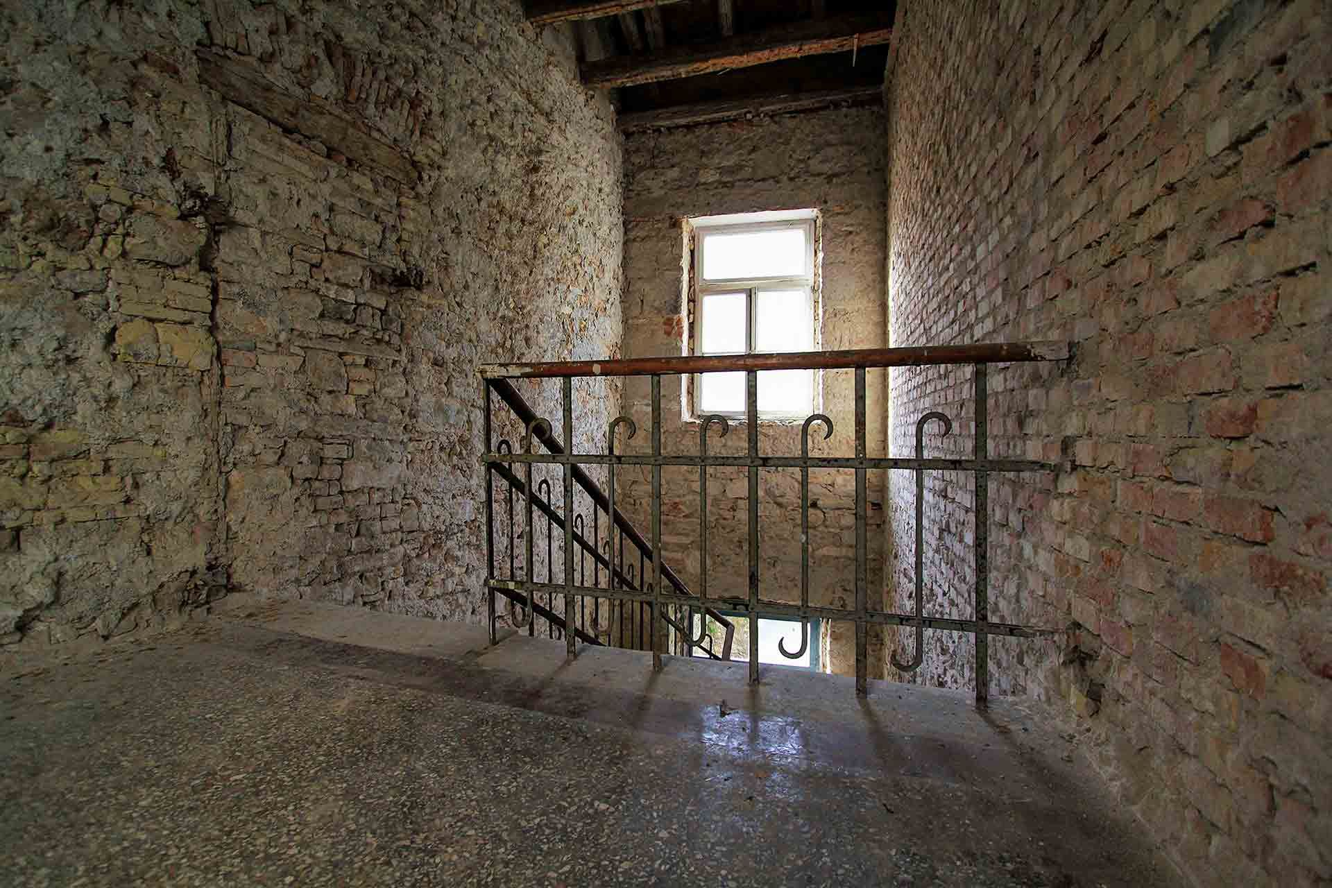 Discover the hidden stories within the ruined staircase of the future Almayer Hotel in Zadar before reconstruction started in 2015, where layers of history unfold