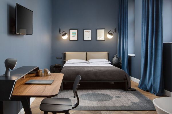 Relaxed sophistication: Interior of Standard double room 'Battara' with a queen-sized bed at Almayer Art & Heritage Hotel's annexe building.