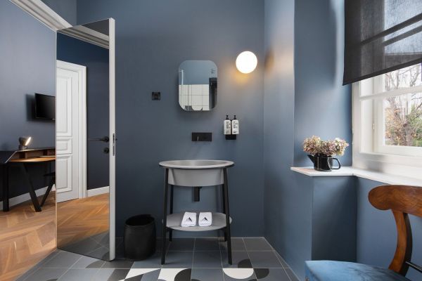 Luminous bathroom interior of Standard double room 'Brkan' at Almayer Art & Heritage Hotel's annexe building.
